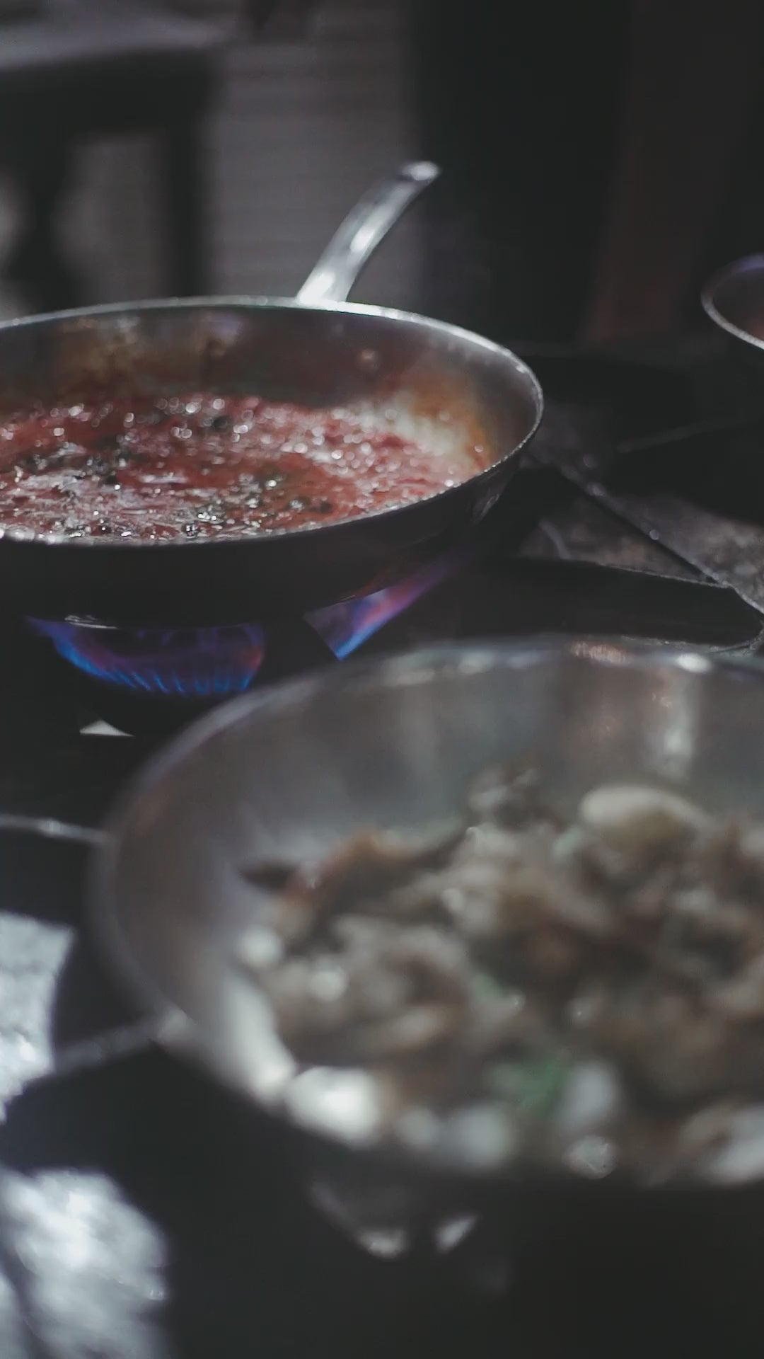 The gas burner on the hob of a commercial kitchen